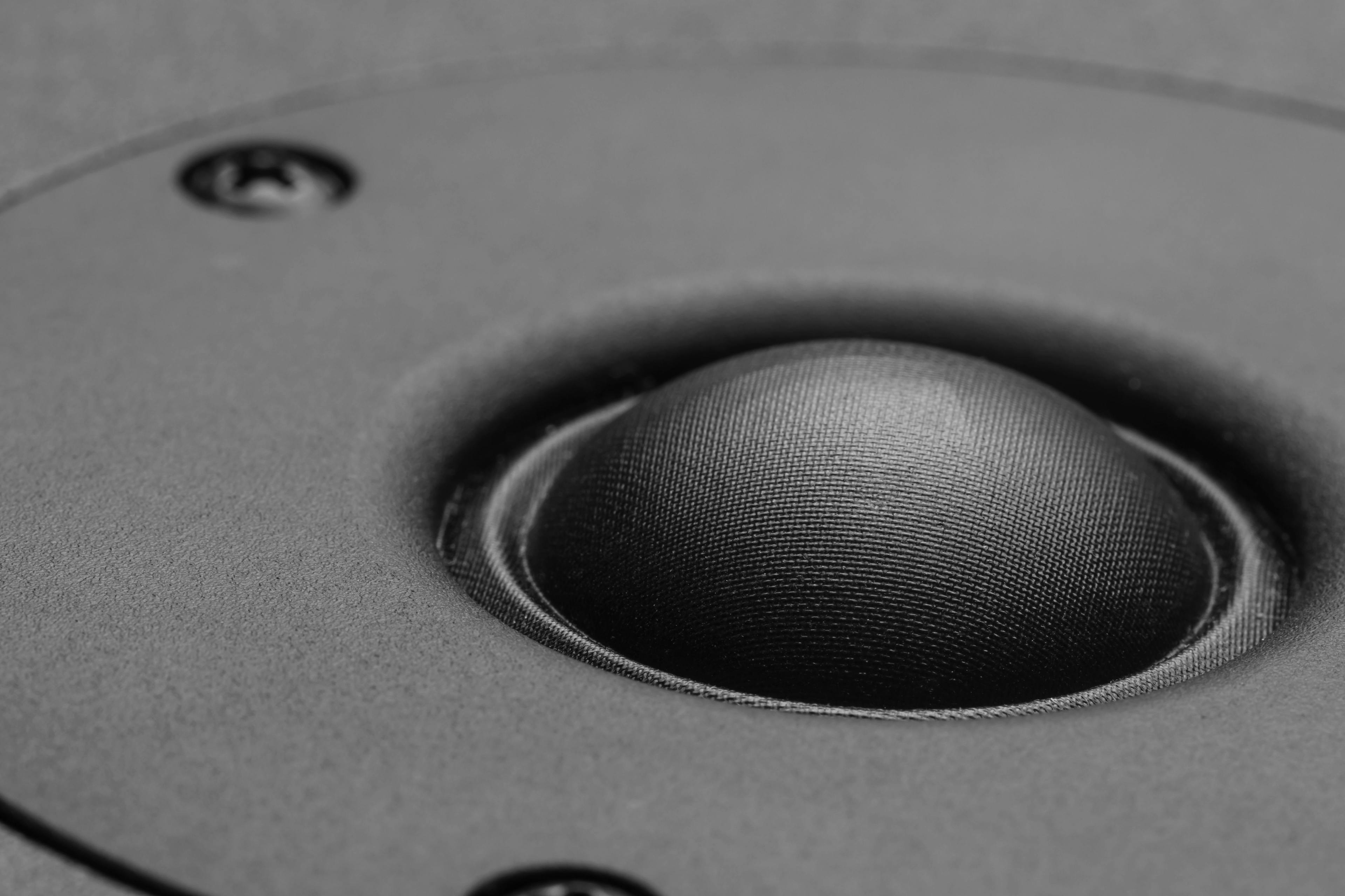 Close of up of speaker dome with synthetic diamond